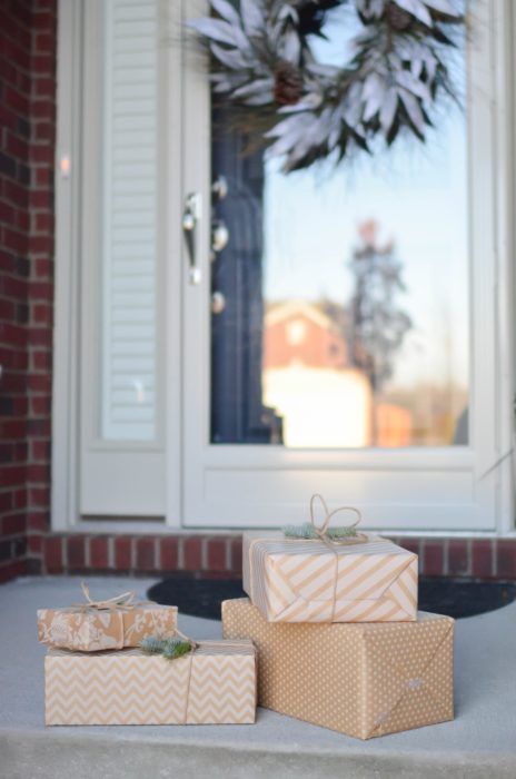 An image of packages wrapped up on a doorstep.
